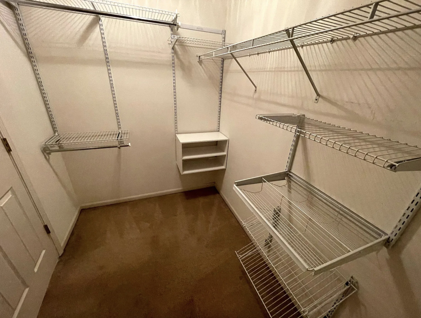 2326 Sunshine Lane Aurora, IL 60503 - Photo 17 of 27 a view of a room with racks on the wall