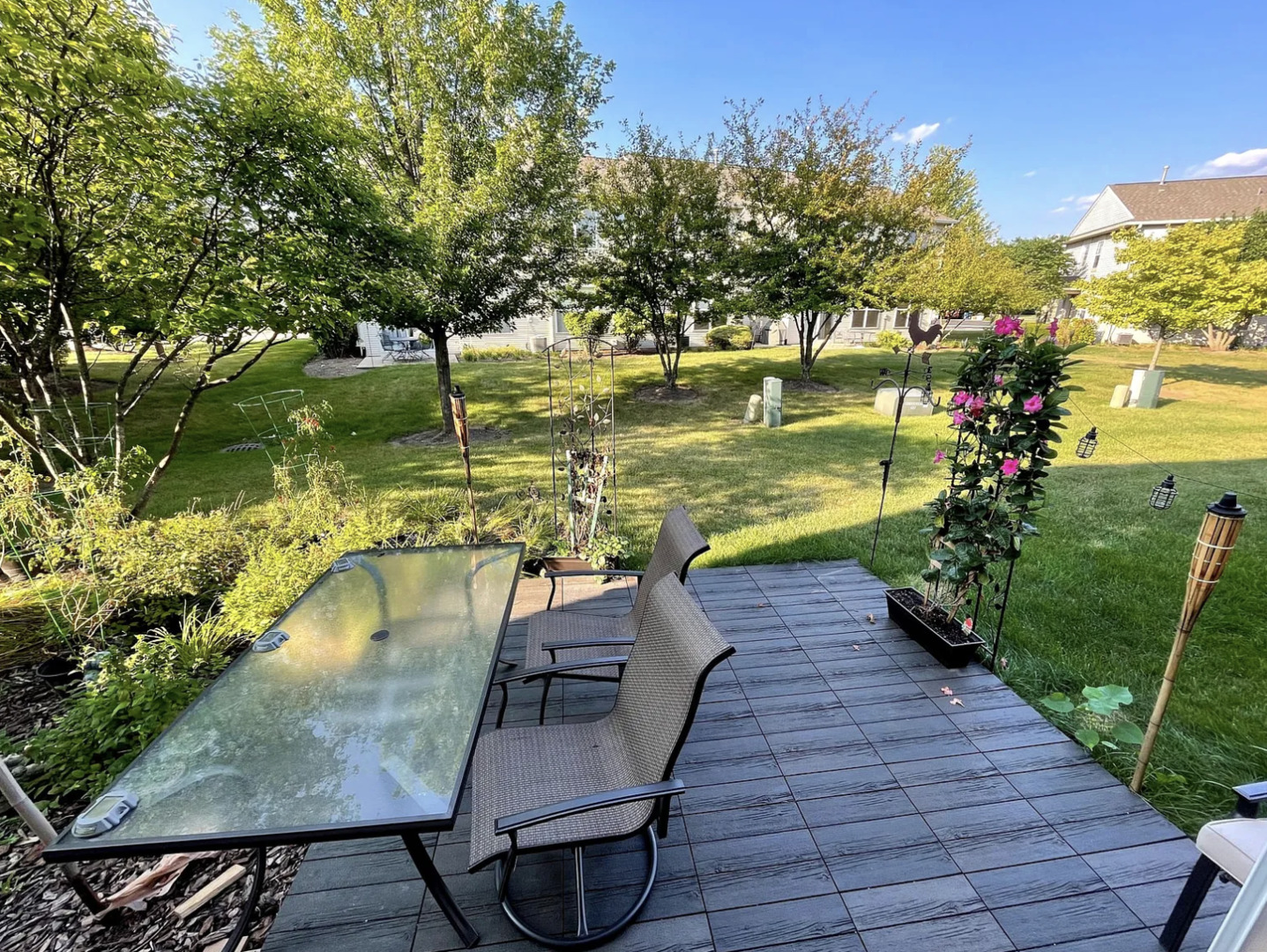 2326 Sunshine Lane Aurora, IL 60503 - Photo 26 of 27 a view of a lake with a yard