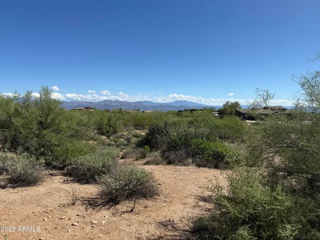 a view of a lake with a mountain