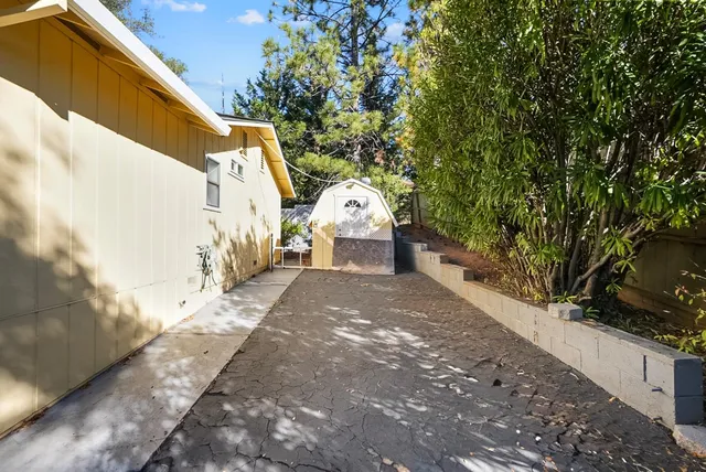 a view of a back yard of the house