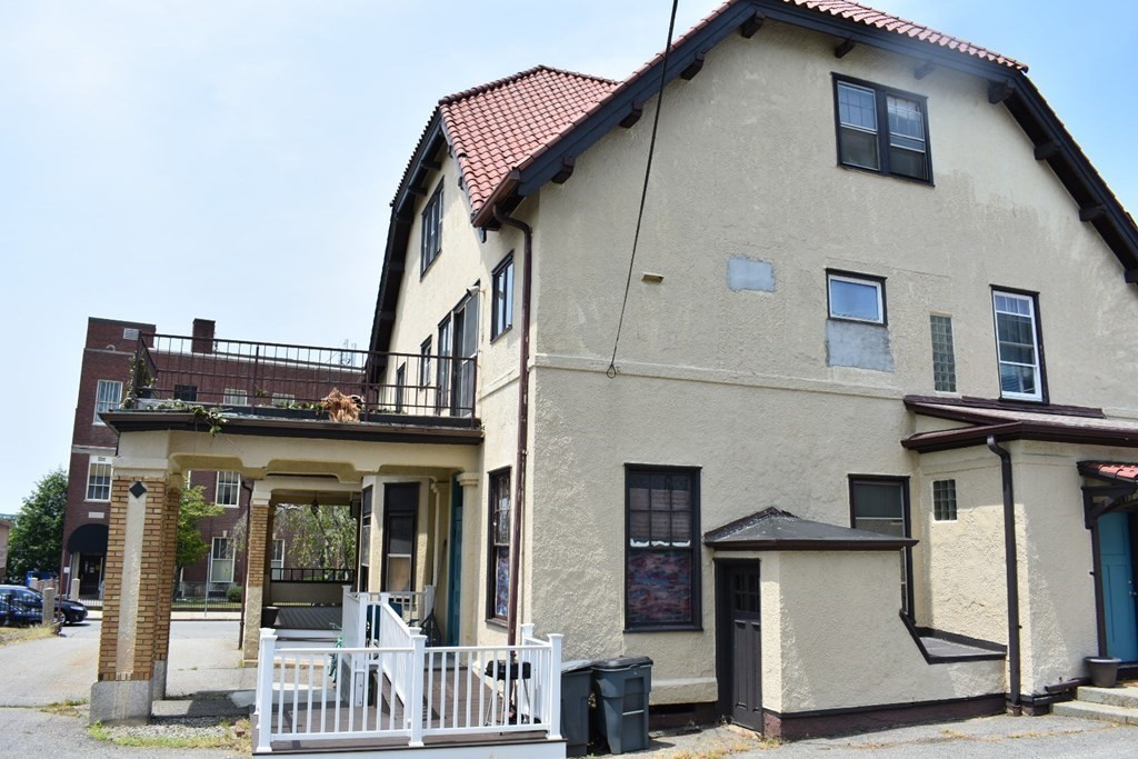 321 North Main Street Fall River, MA 02720 - Photo 3 of 38 a view of a building with a outdoor space