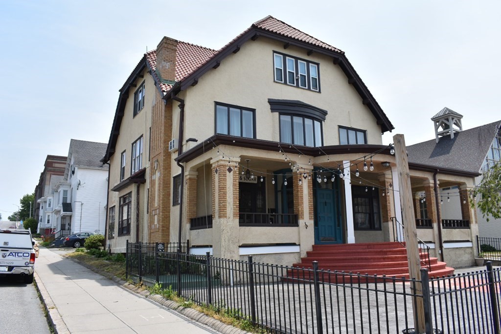 321 North Main Street Fall River, MA 02720 - Photo 8 of 38 a view of a white house with a large windows