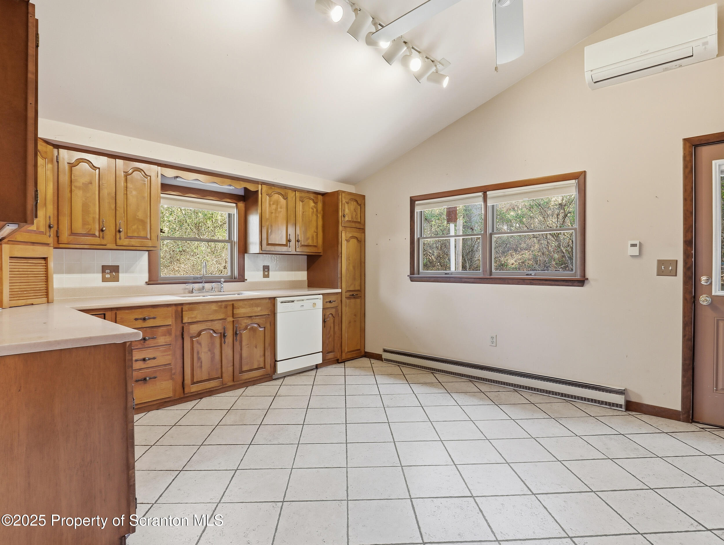 1 Ford Drive Tunkhannock, PA 18657 - Photo 11 of 33 a kitchen with a cabinets a stove a sink a refrigerator and window