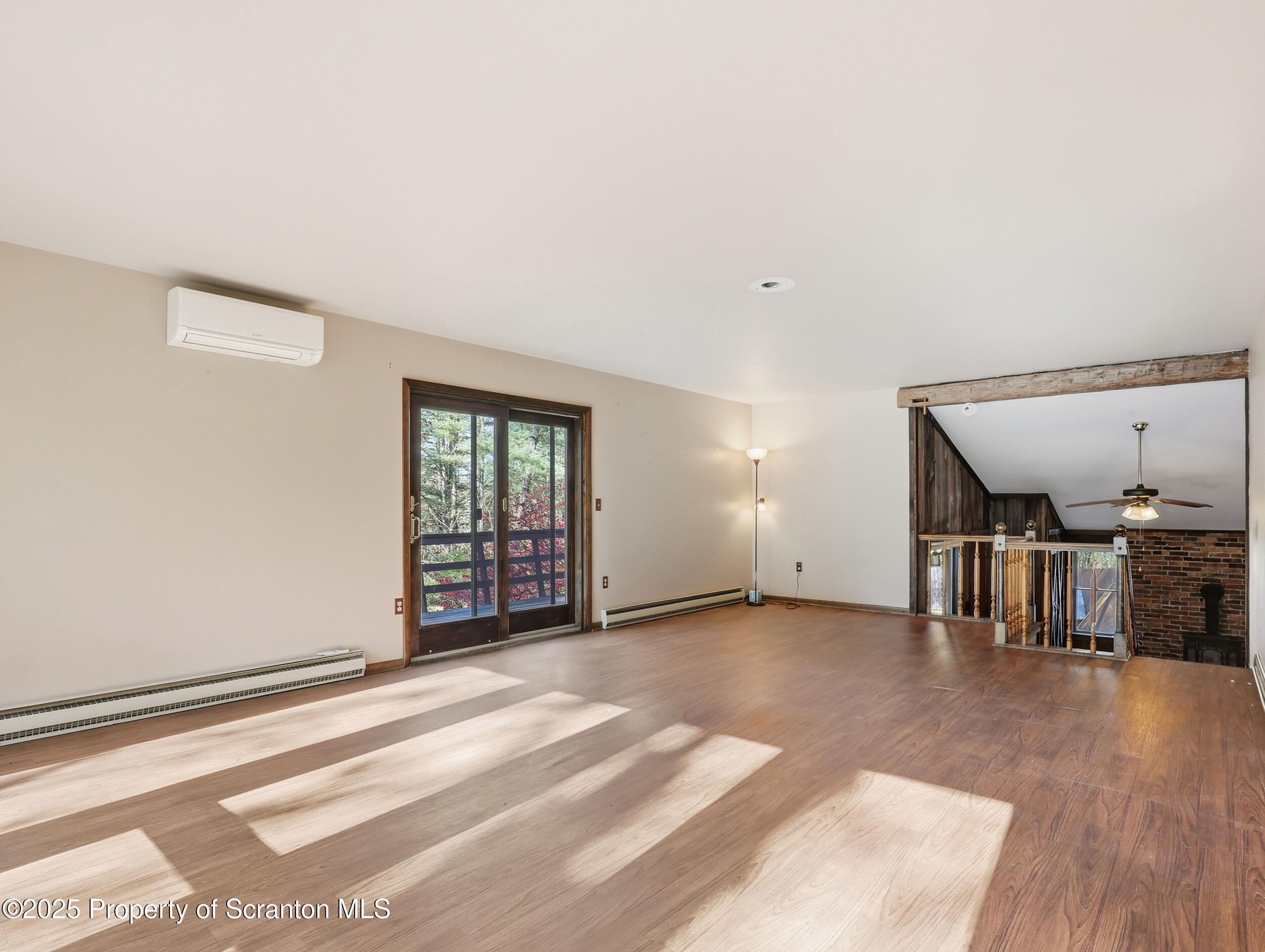 1 Ford Drive Tunkhannock, PA 18657 - Photo 14 of 33 a view of empty room with wooden floor and fan