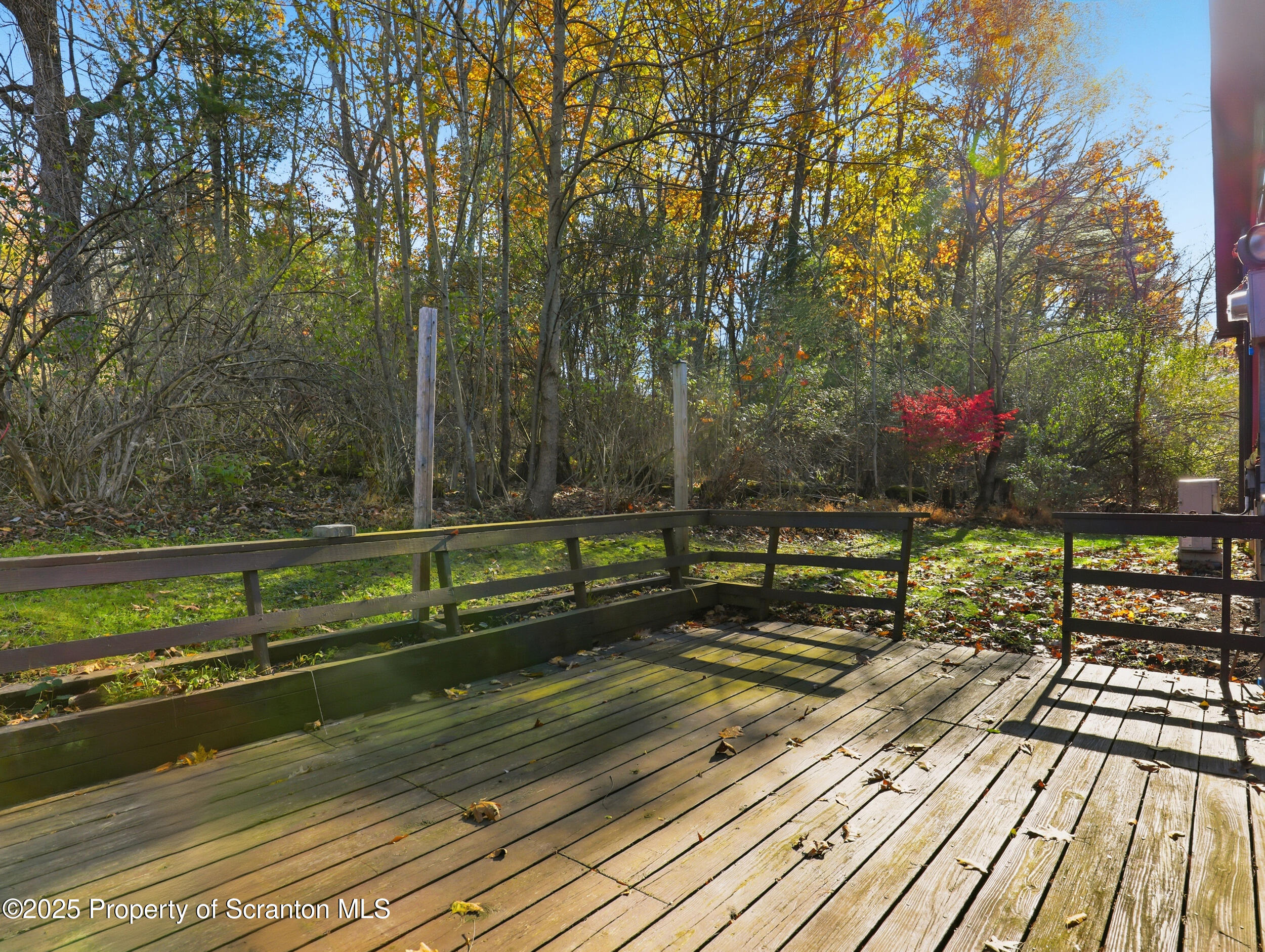 1 Ford Drive Tunkhannock, PA 18657 - Photo 28 of 33 a view of a balcony with wooden floor and trees