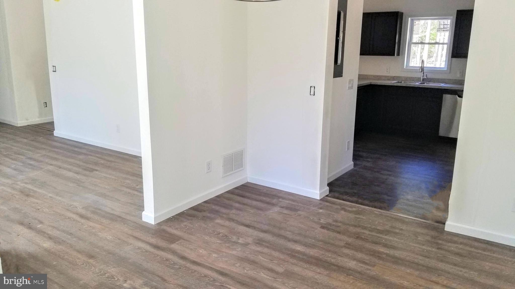 711 Jackson Road Newtonville, NJ 08346 - Photo 11 of 20 Dining room of spec house
