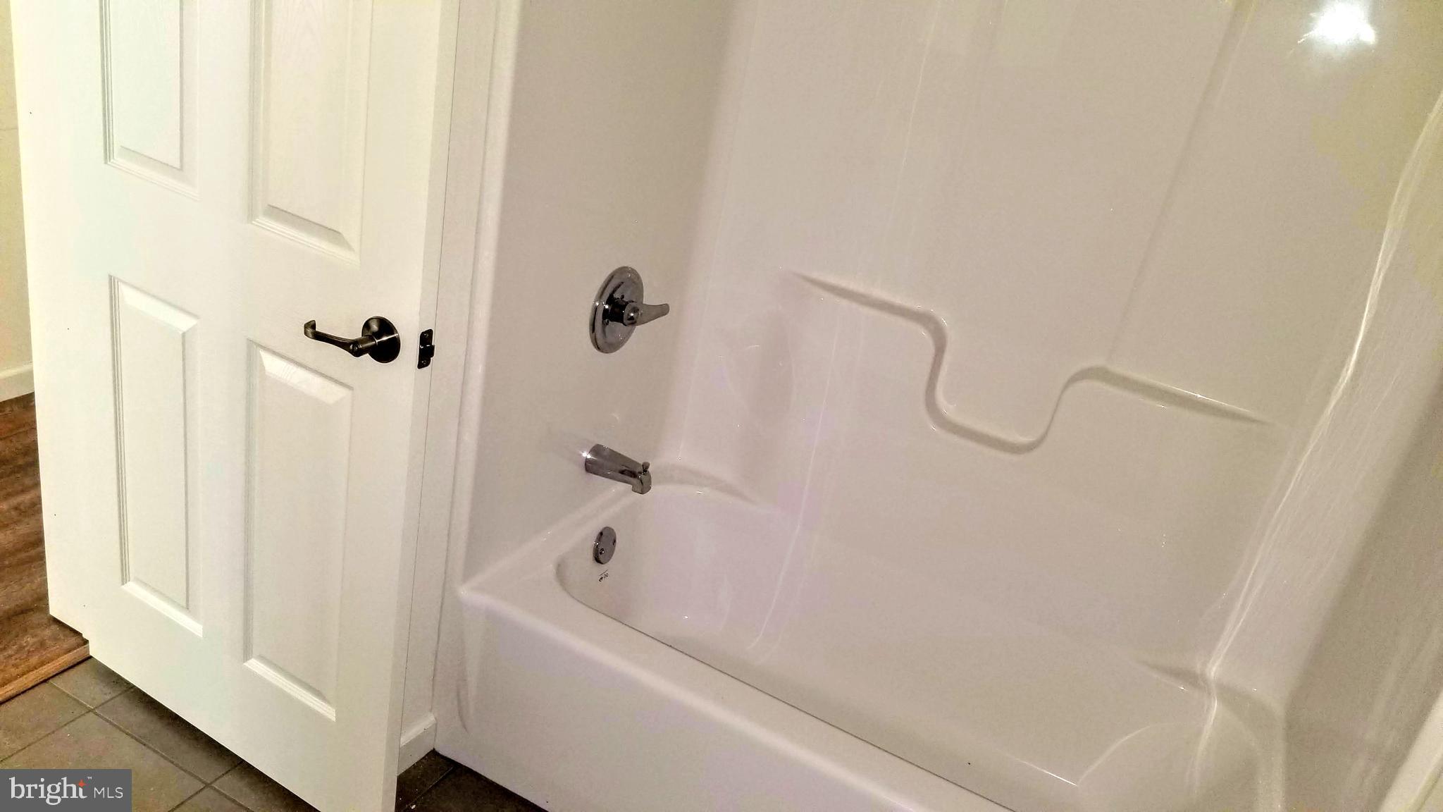 711 Jackson Road Newtonville, NJ 08346 - Photo 17 of 20 Main Bathroom of spec house