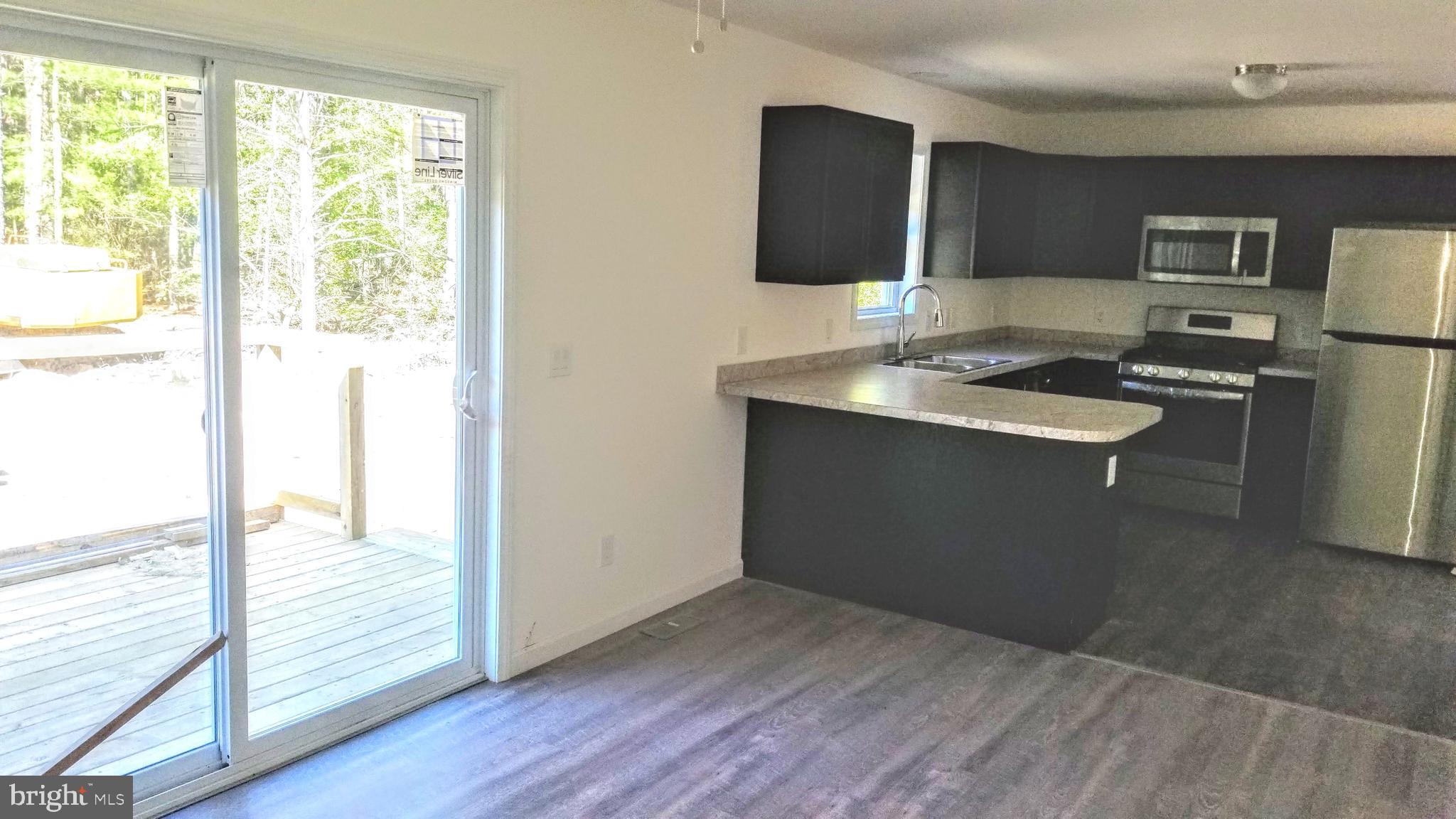 711 Jackson Road Newtonville, NJ 08346 - Photo 10 of 20 Country Kitchen Dining Area of spec house