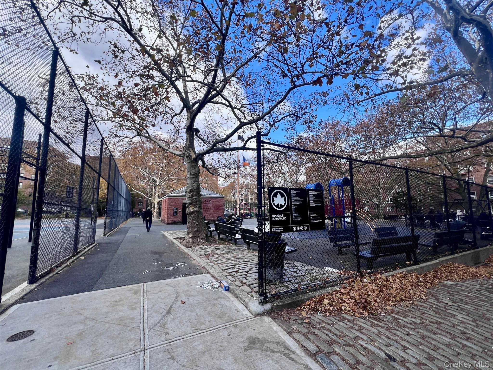 102-32 65th Avenue, Unit B37 Queens, NY 11375 - Photo 21 of 23 a building with trees in front of it