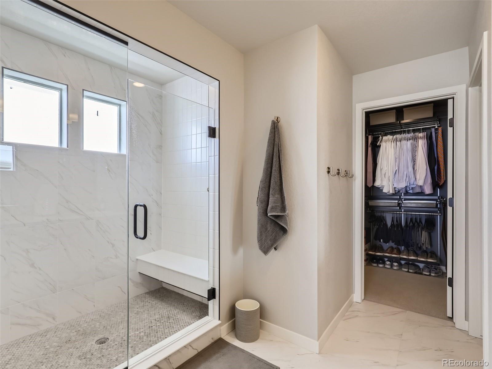 4495 Riviera Court Aurora, CO 80019 - Photo 12 of 28 a bathroom with a shower