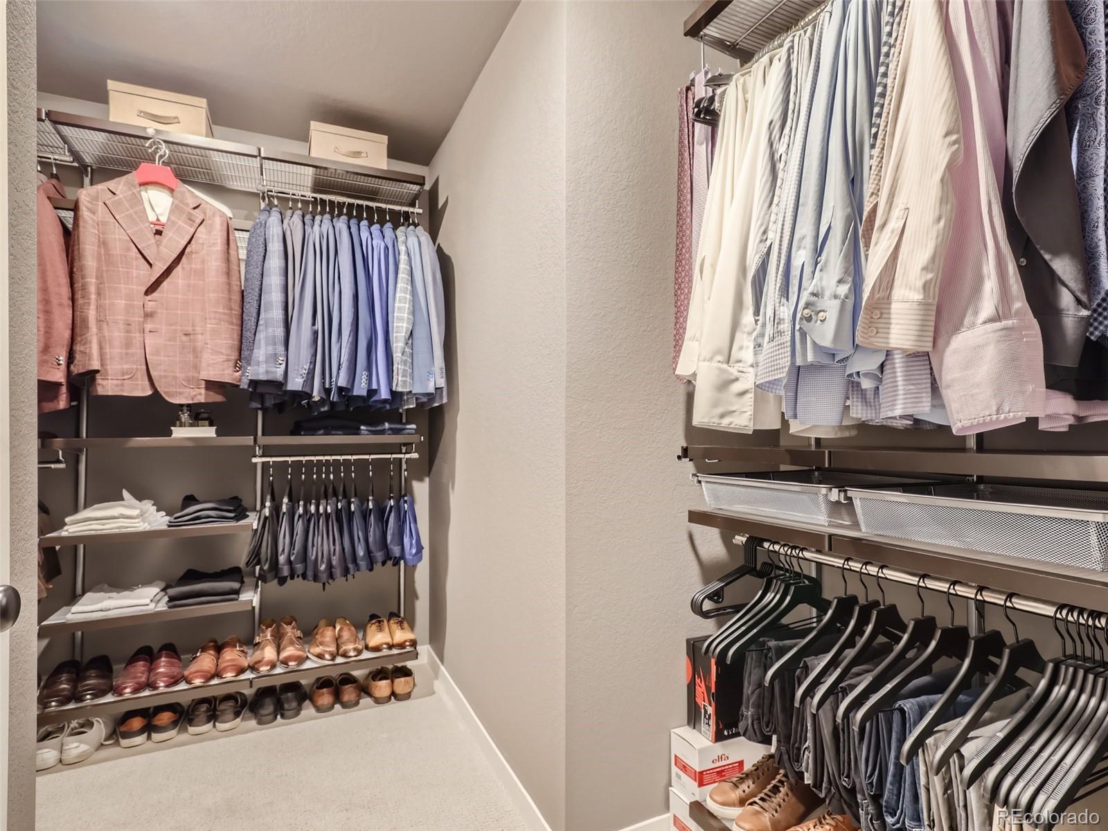 4495 Riviera Court Aurora, CO 80019 - Photo 14 of 28 a view of walk in closet with clothes and shoes