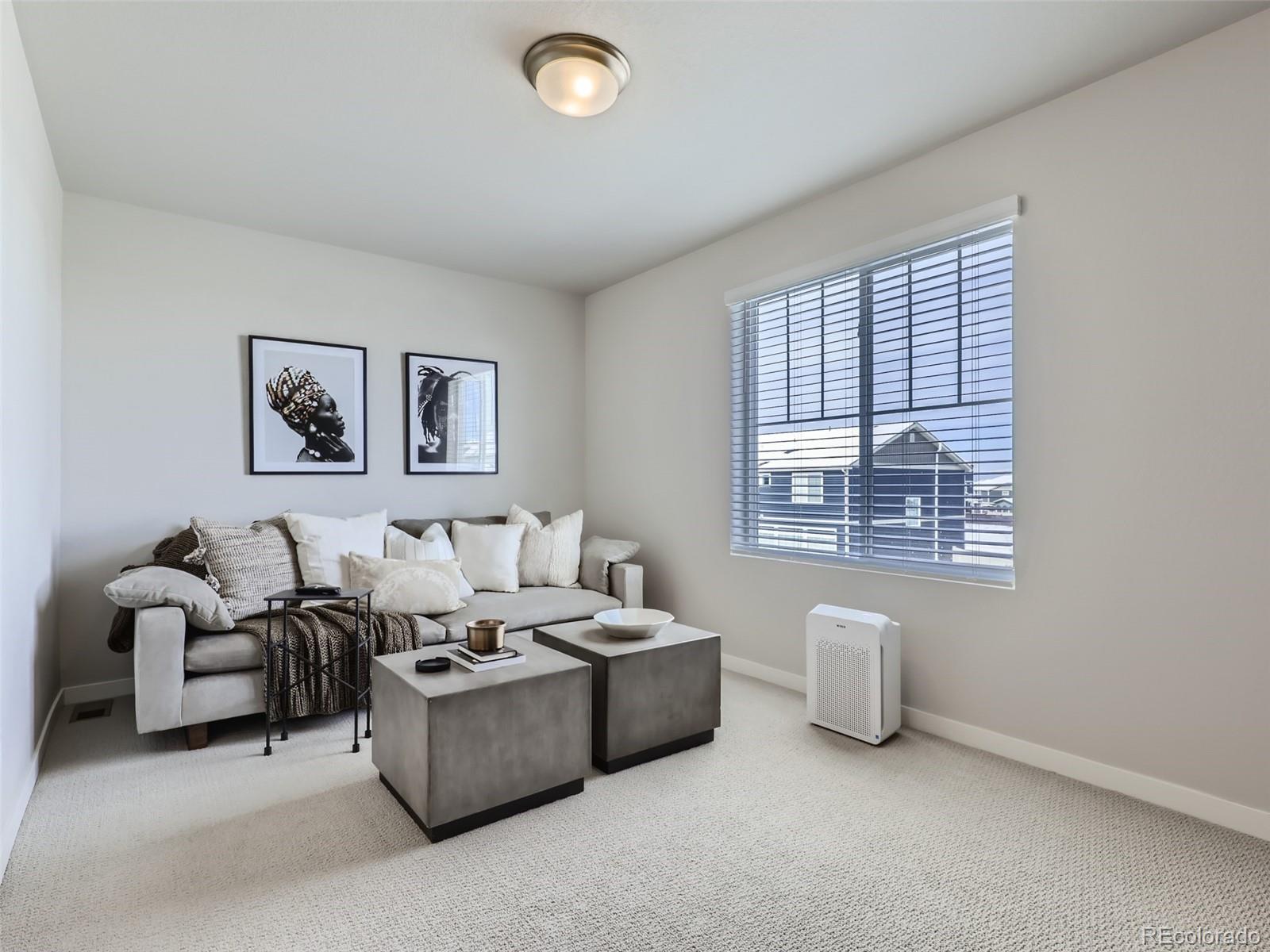 4495 Riviera Court Aurora, CO 80019 - Photo 20 of 28 a living room with furniture