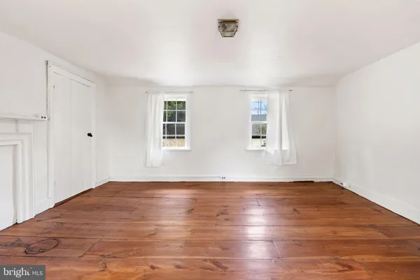 a view of entryway with wooden floor