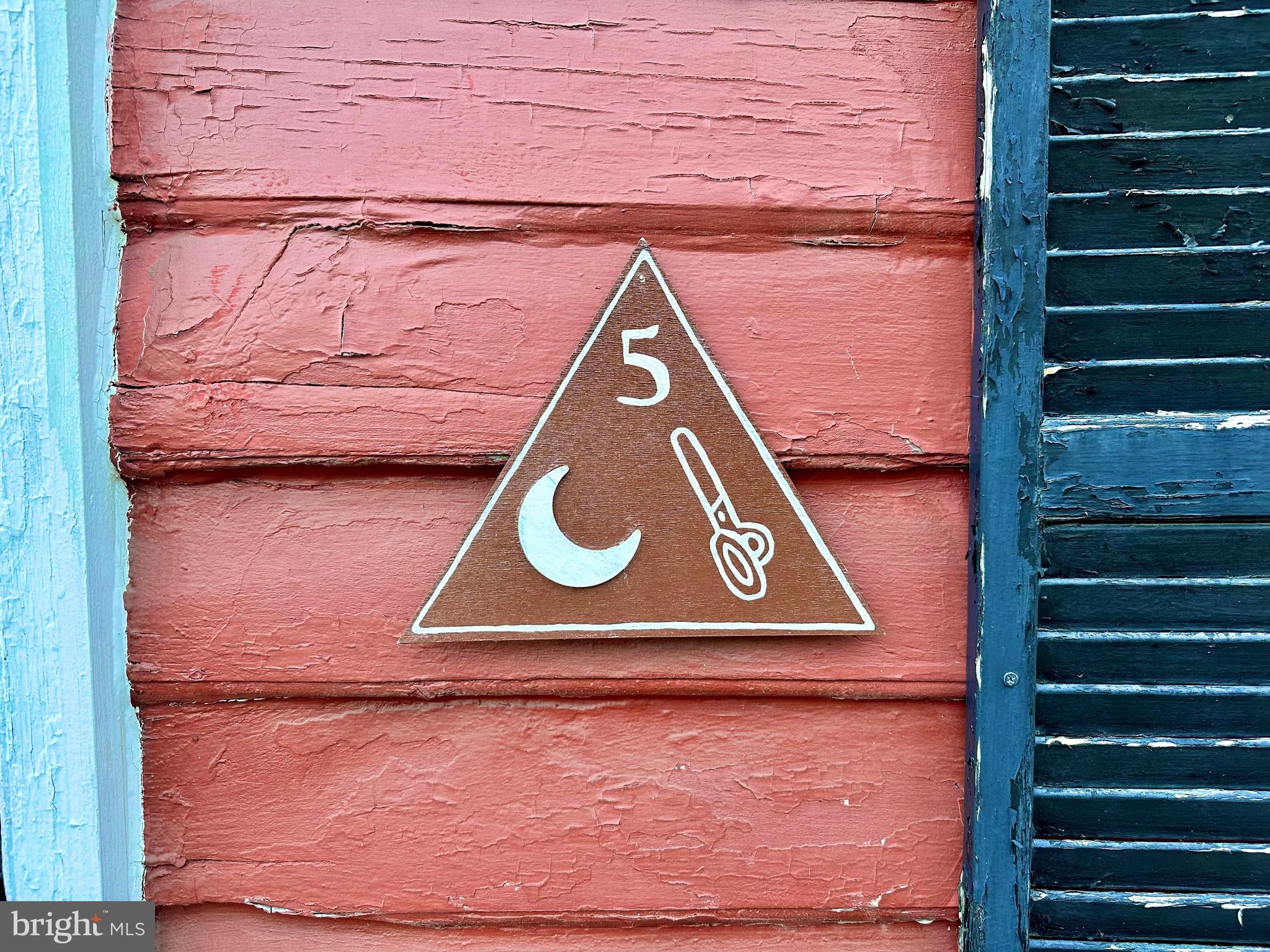 7379 Queen Street Middleway, WV 25430 - Photo 3 of 58 a sign that is on the wall of a building