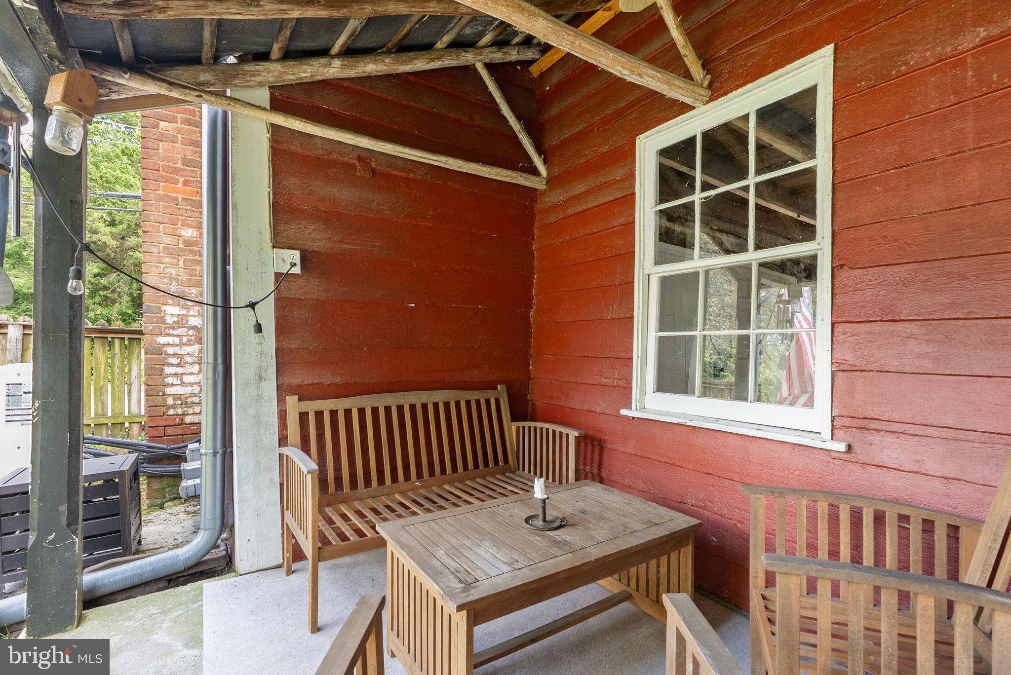 7379 Queen Street Middleway, WV 25430 - Photo 39 of 58 a view of a deck with chair and wooden floor