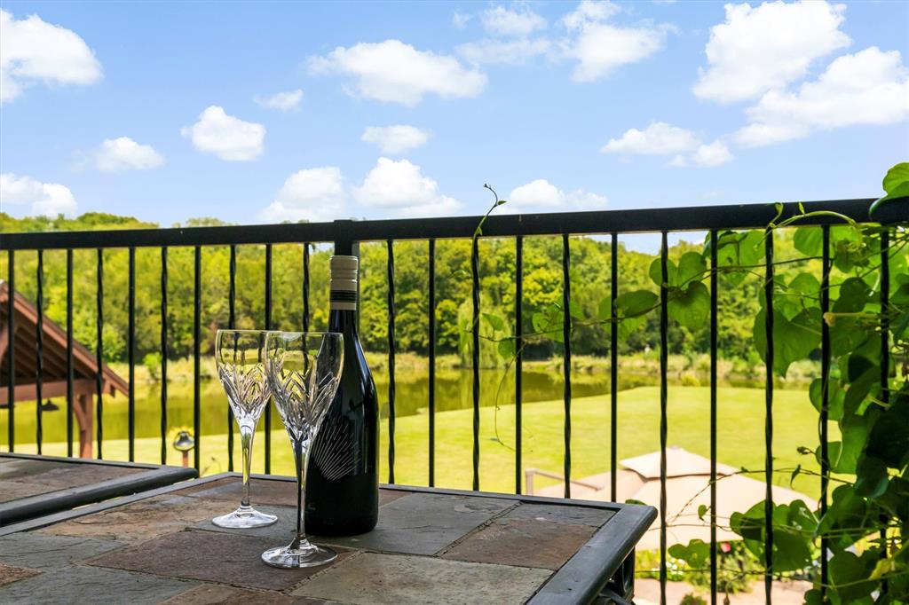 539 Ridge Point Drive Heath, TX 75126 - Photo 20 of 29 a view of a city from a balcony