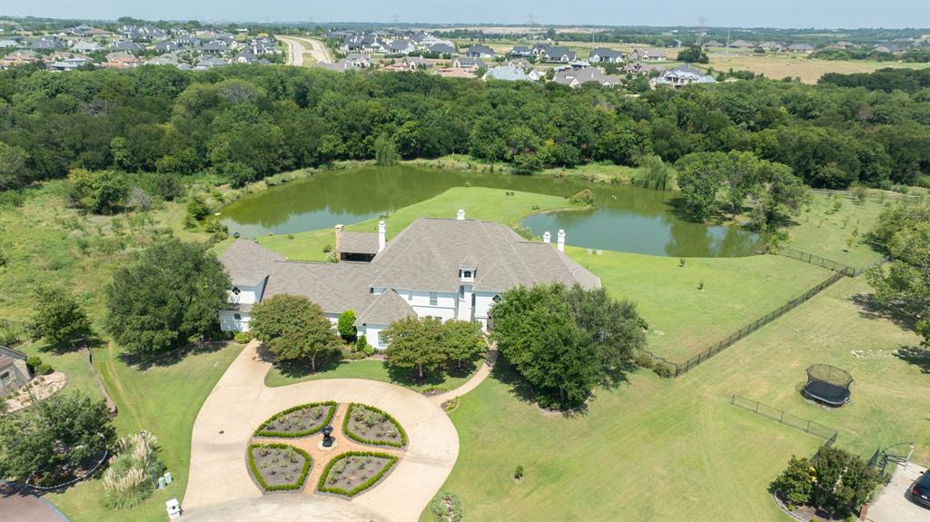 539 Ridge Point Drive Heath, TX 75126 - Photo 4 of 29 an aerial view of a house with yard swimming pool and outdoor seating