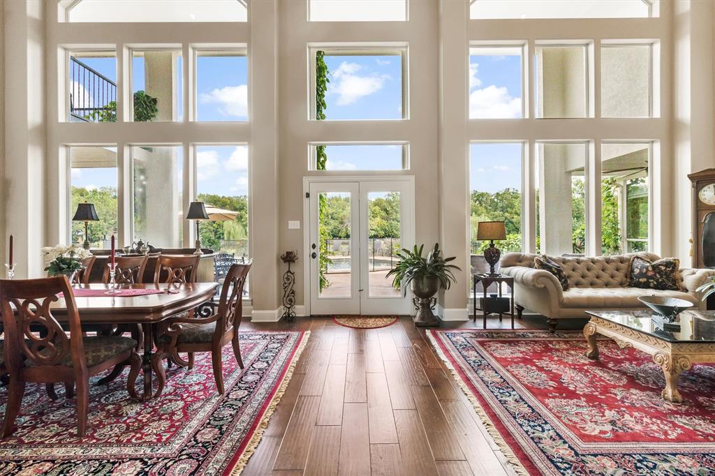 539 Ridge Point Drive Heath, TX 75126 - Photo 10 of 29 a living room with furniture and large windows