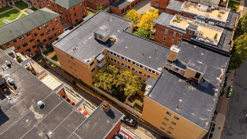 123 Sewall Avenue, Unit LC Brookline, MA 02446 - Photo 20 of 32 an aerial view of a building with a yard
