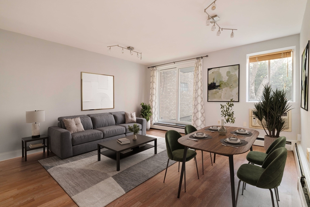 123 Sewall Avenue, Unit LC Brookline, MA 02446 - Photo 2 of 32 a living room with furniture and a large window