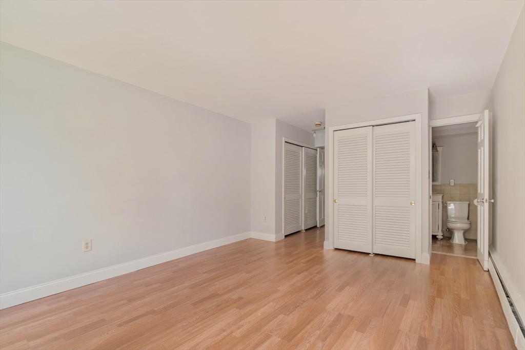123 Sewall Avenue, Unit LC Brookline, MA 02446 - Photo 31 of 32 a view of empty room with wooden floor