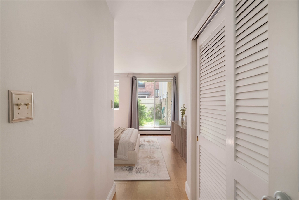 123 Sewall Avenue, Unit LC Brookline, MA 02446 - Photo 6 of 32 a view of a room that has a window in it