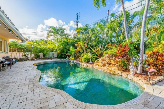 a view of a lake with a yard