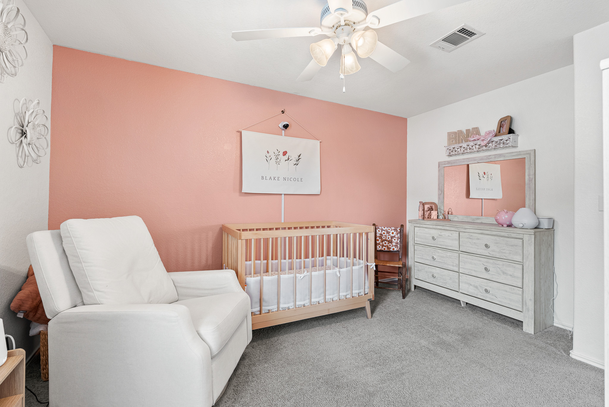 136 Copper Lane Kyle, TX 78640 - Photo 27 of 33 Carpeted bedroom with a crib and ceiling fan