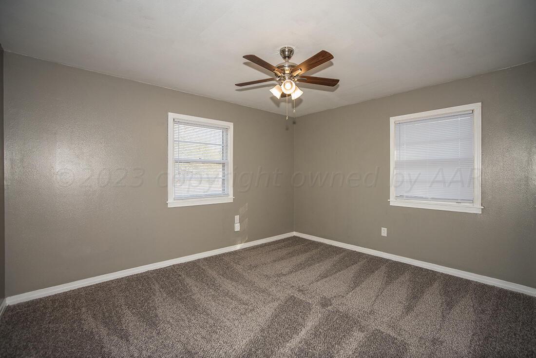 4008 Gables Street Amarillo, TX 79110 - Photo 7 of 15 a view of an empty room with a window