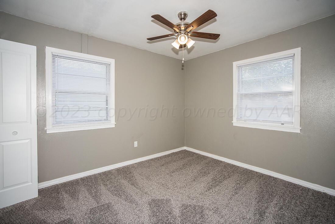 4008 Gables Street Amarillo, TX 79110 - Photo 8 of 15 an empty room with a window