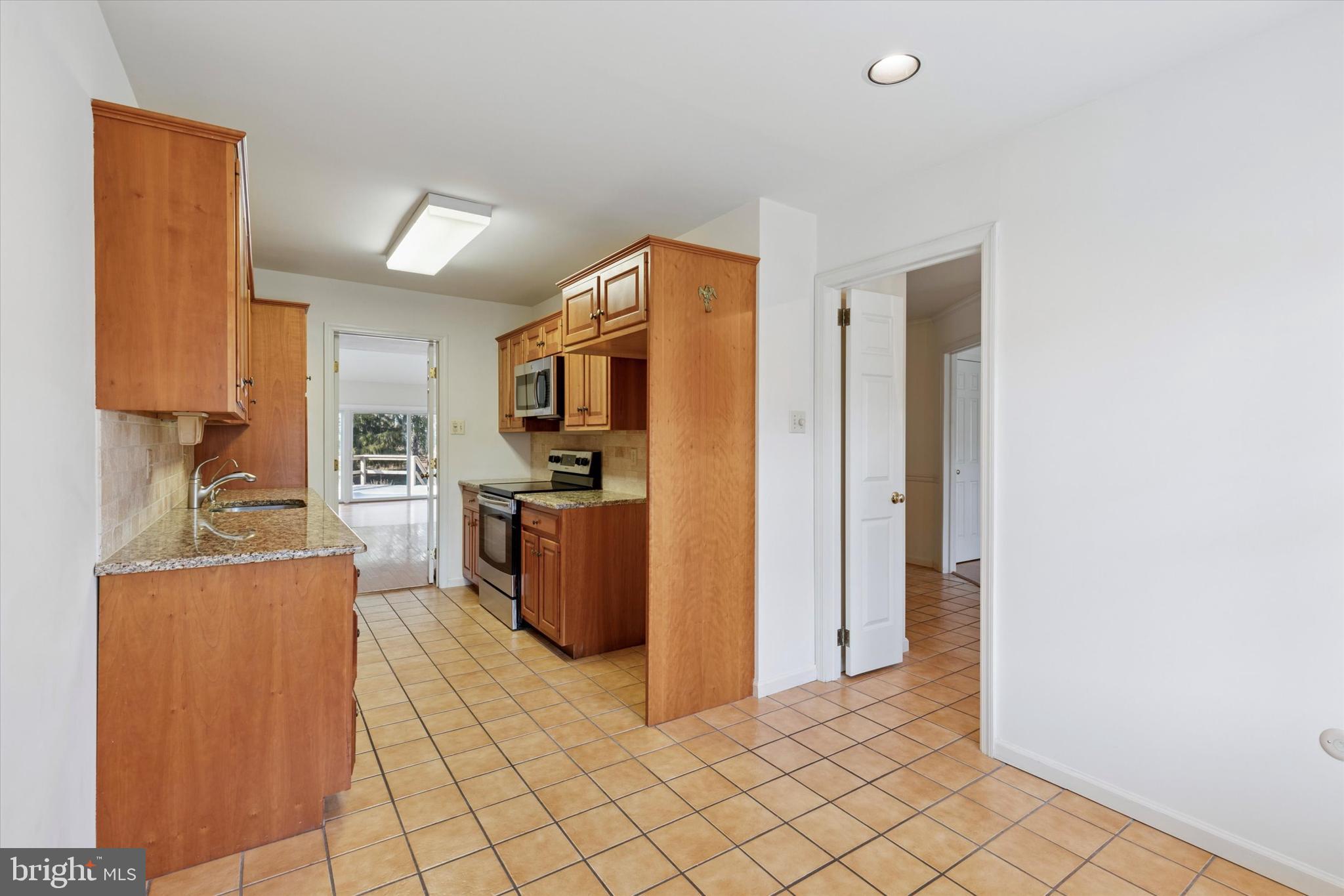 12 Wingstone Lane Devon, PA 19333 - Photo 11 of 31 a view of a kitchen with a sink