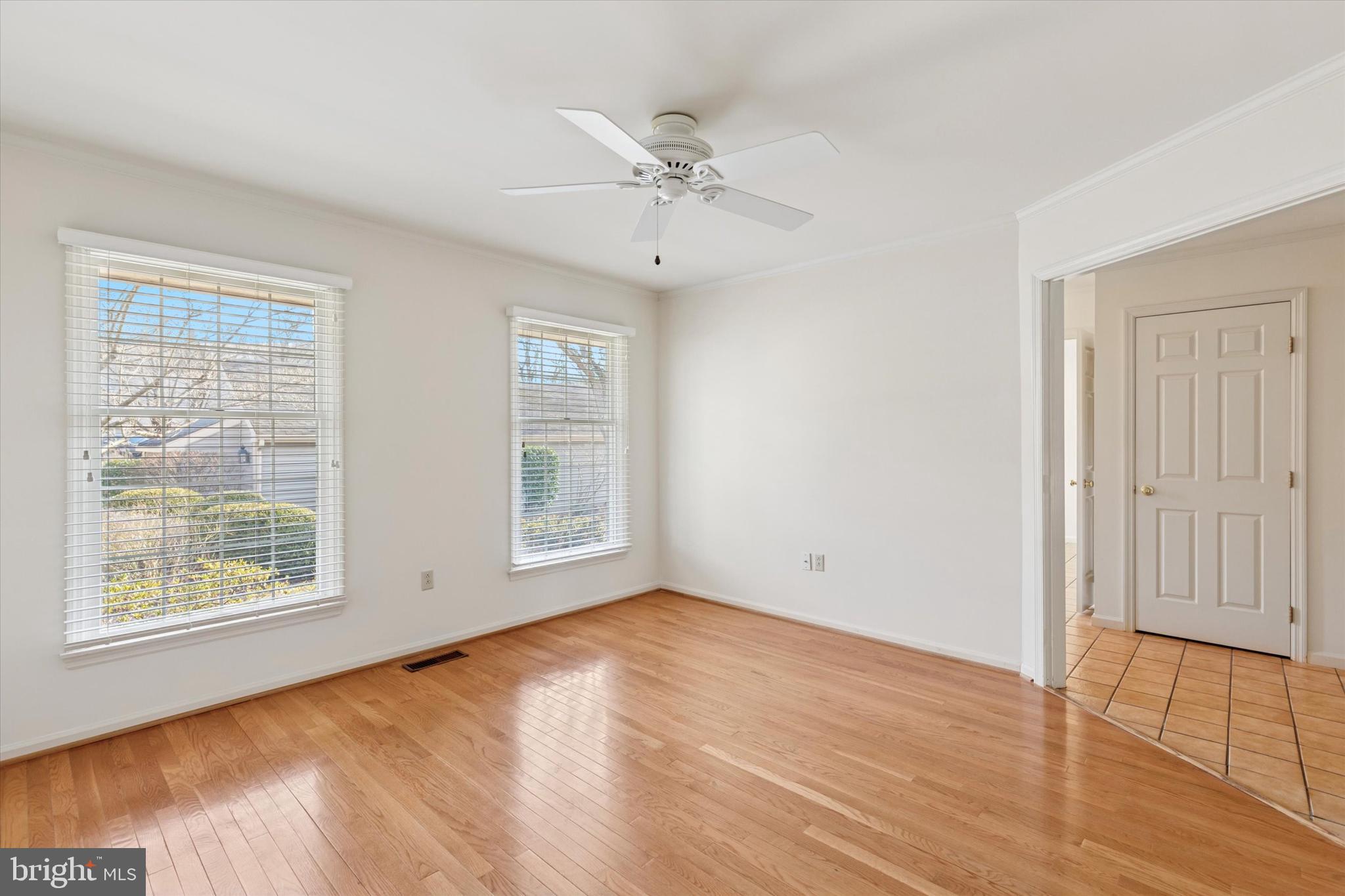 12 Wingstone Lane Devon, PA 19333 - Photo 4 of 31 wooden floor in an empty room with a window