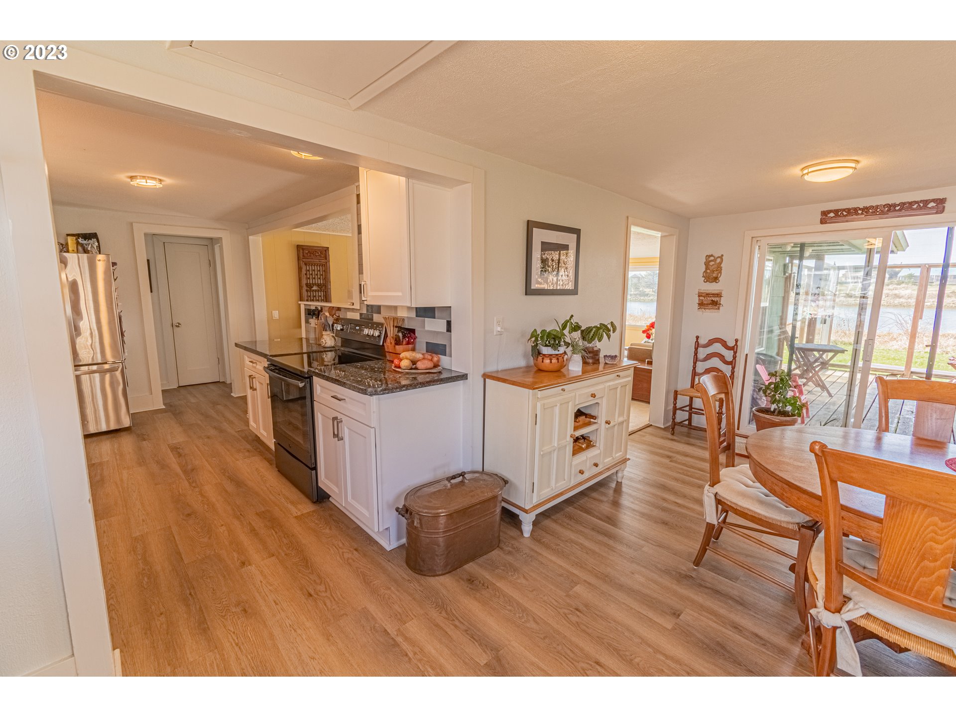 35160 Rueppel Avenue Pacific City, OR 97135 - Photo 11 of 26 a living room with furniture and a wooden floor