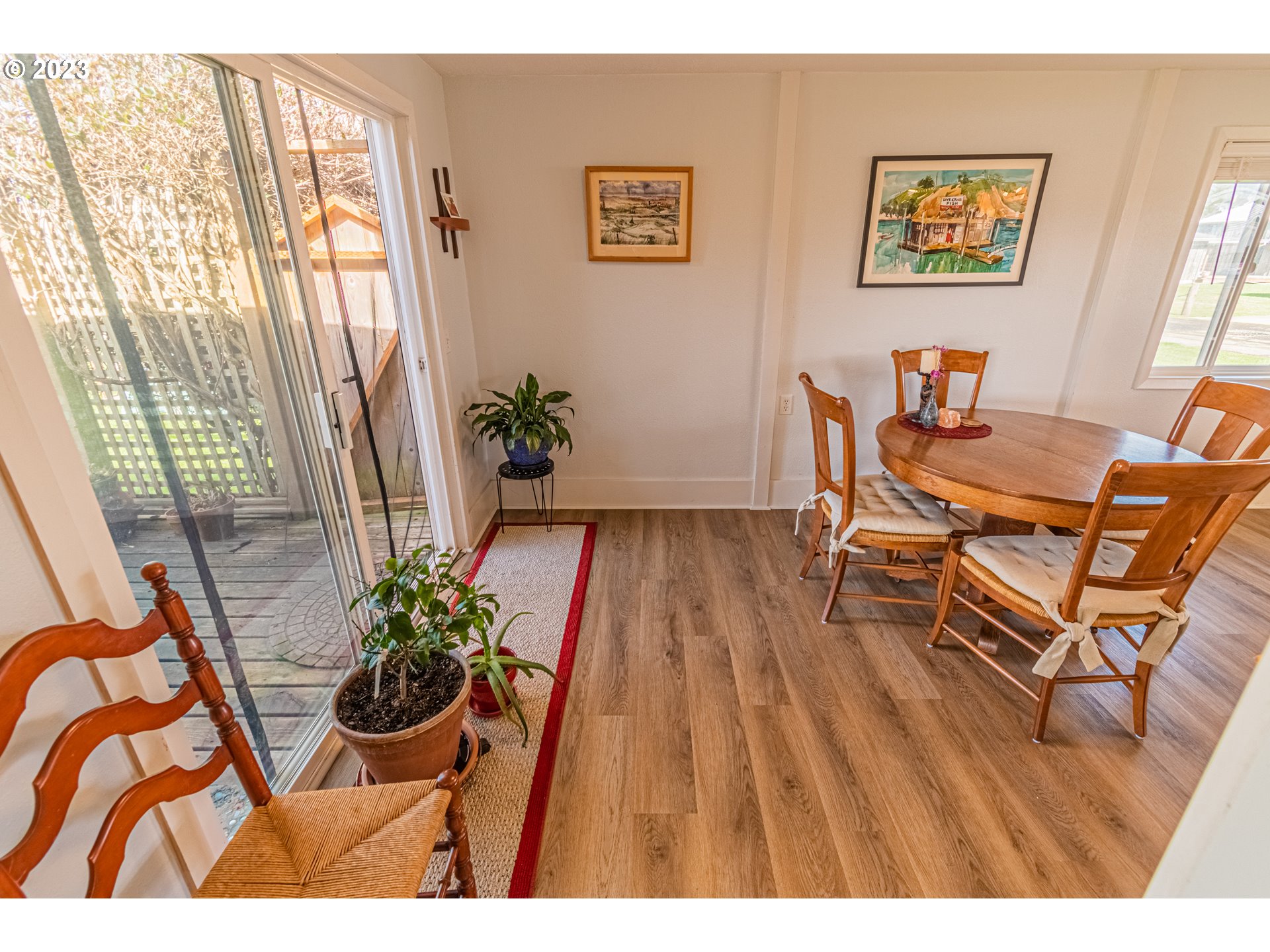 35160 Rueppel Avenue Pacific City, OR 97135 - Photo 15 of 26 a workspace with furniture and a potted plant