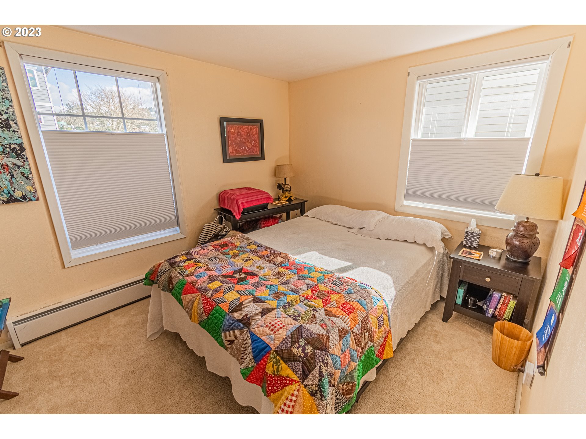 35160 Rueppel Avenue Pacific City, OR 97135 - Photo 17 of 26 a bedroom with a bed and window