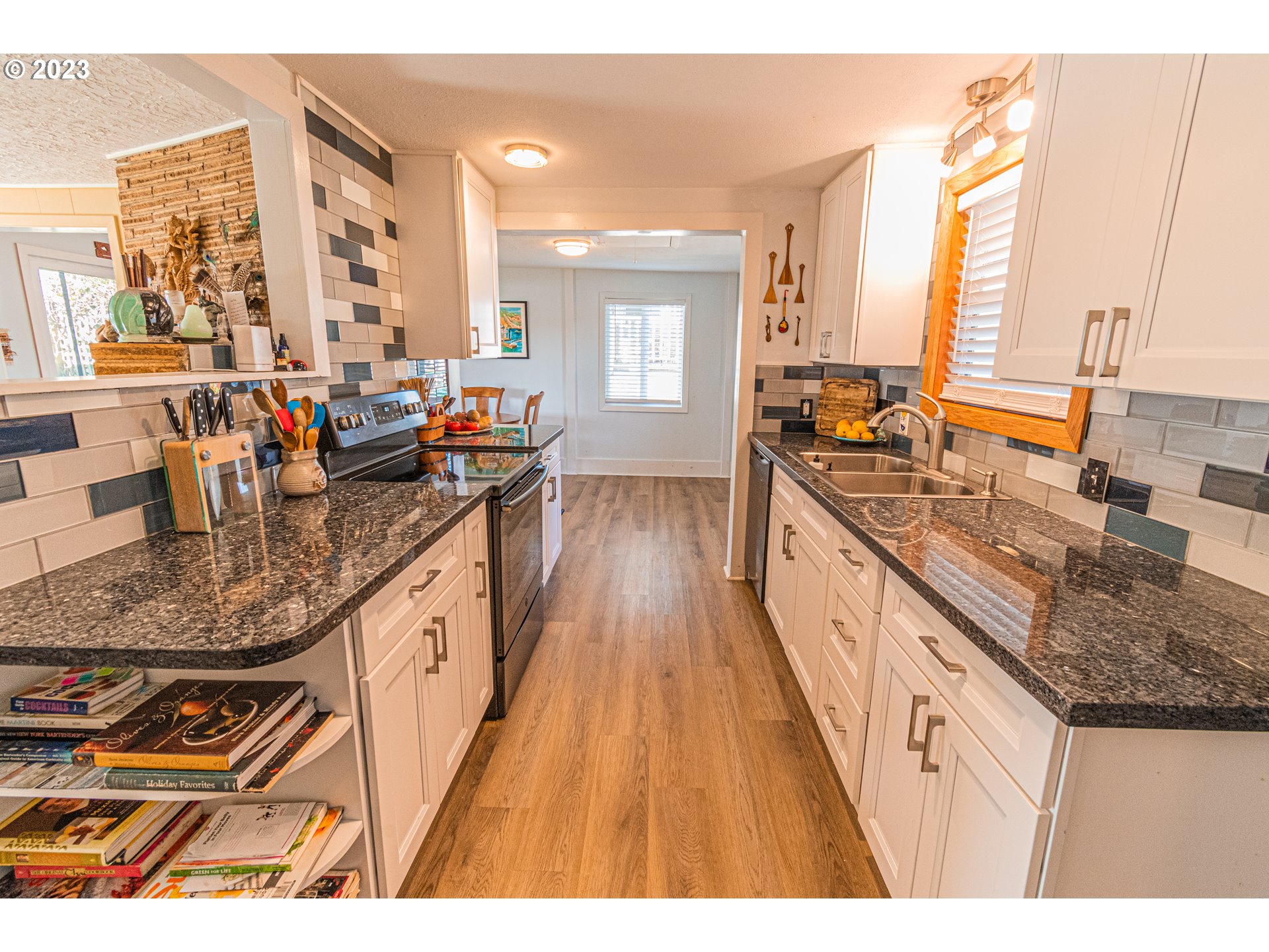 35160 Rueppel Avenue Pacific City, OR 97135 - Photo 6 of 26 a kitchen with sink and view of living room
