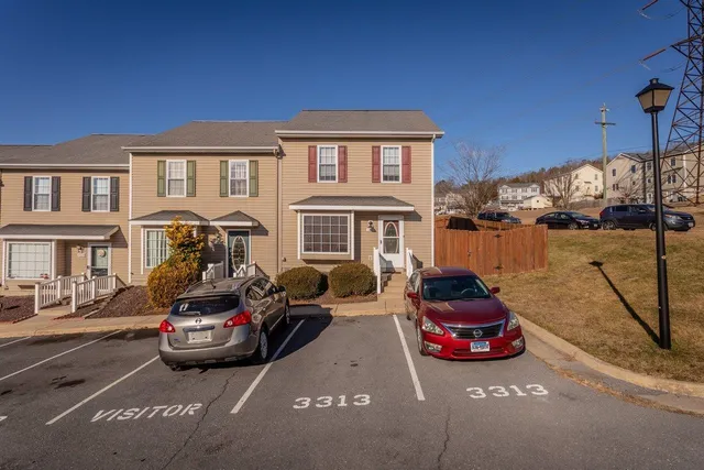a car parked in front of a house