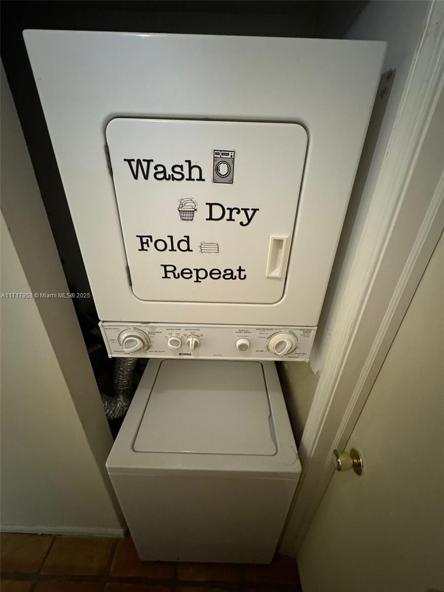 812 Southwest 9th St Circle, Unit 101 Boca Raton, FL 33486 - Photo 12 of 17 a close view of washer and dryer