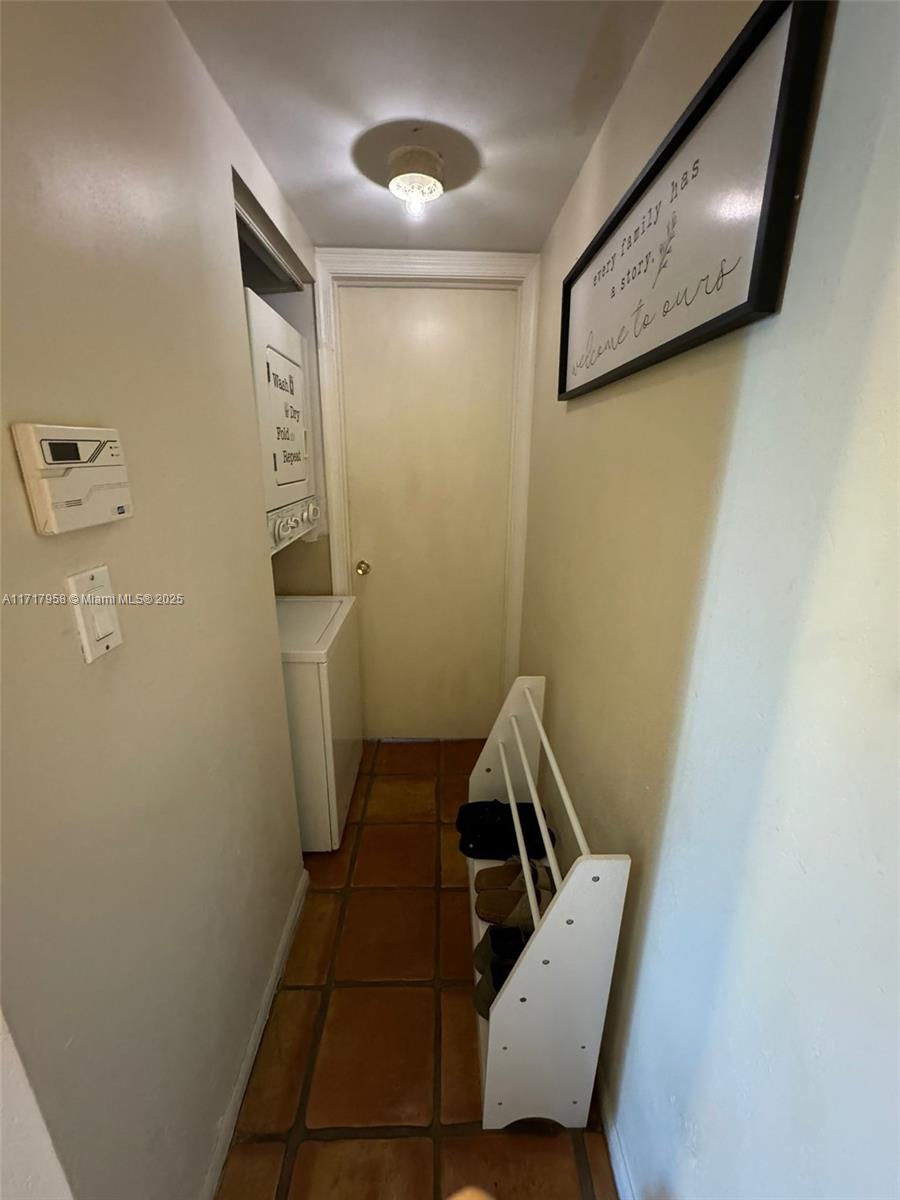 812 Southwest 9th St Circle, Unit 101 Boca Raton, FL 33486 - Photo 2 of 17 a bathroom with a sink and toilet