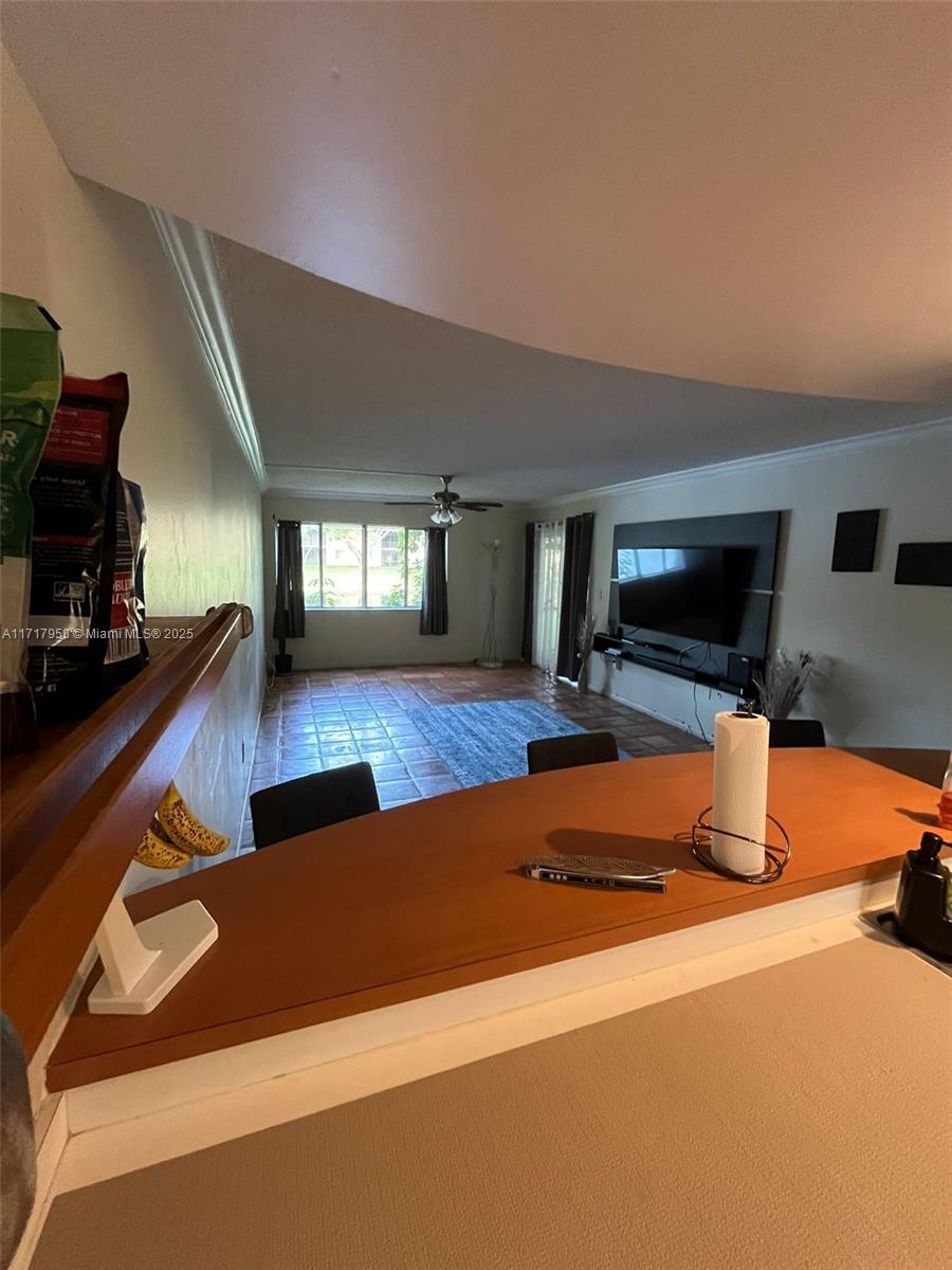 812 Southwest 9th St Circle, Unit 101 Boca Raton, FL 33486 - Photo 8 of 17 a room with furniture pool table and flat screen tv