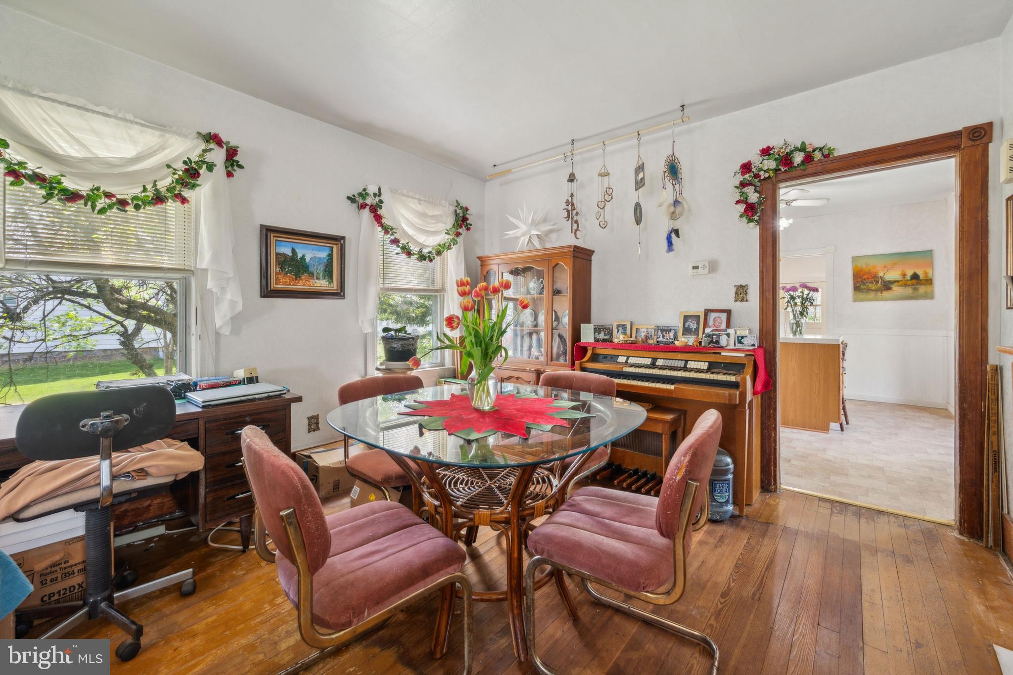 21 Devlin Avenue Burlington, NJ 08016 - Photo 7 of 20 a view of a dining room with furniture a rug and wooden floor