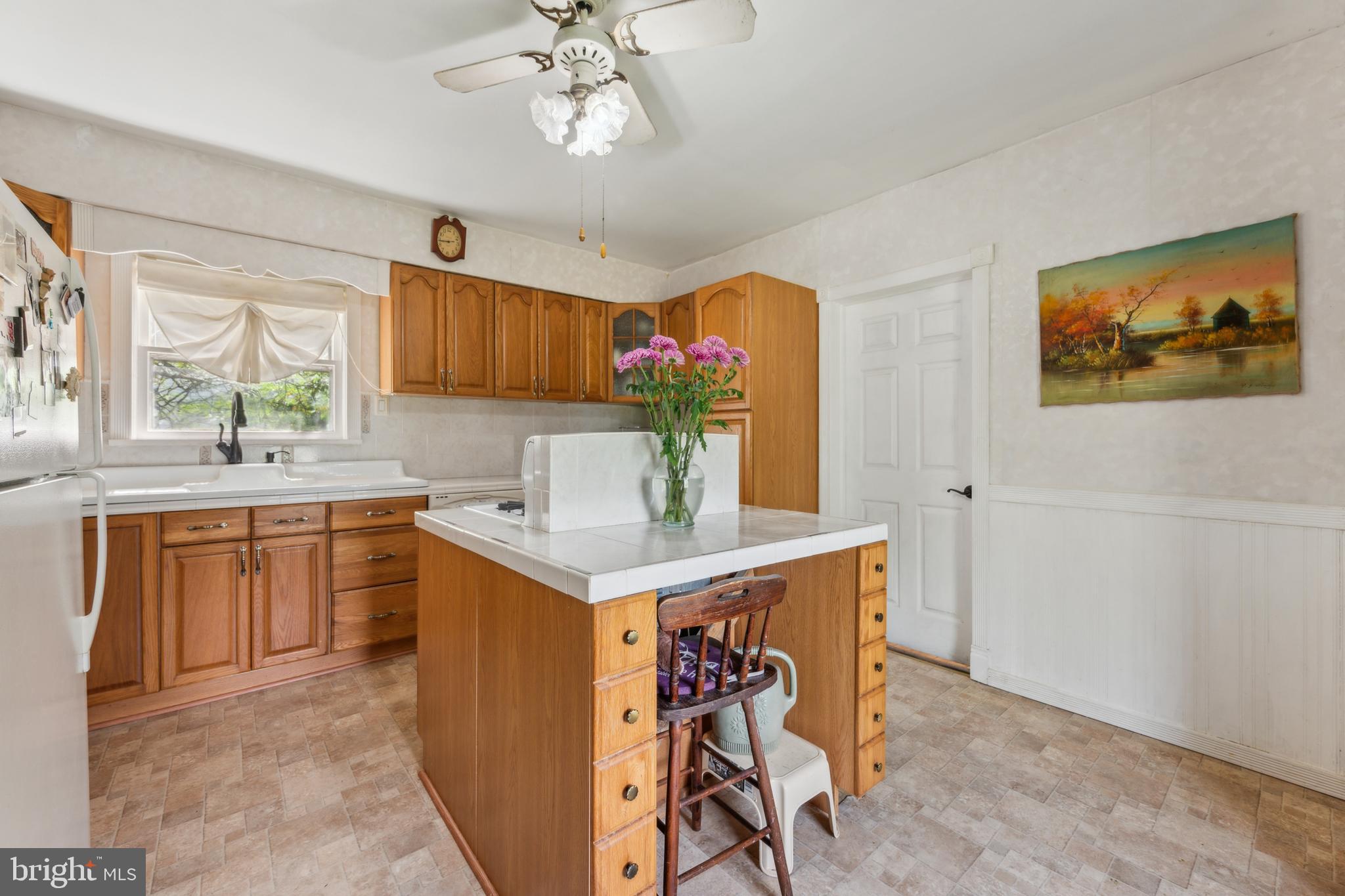 21 Devlin Avenue Burlington, NJ 08016 - Photo 9 of 20 a kitchen with a sink appliances and cabinets