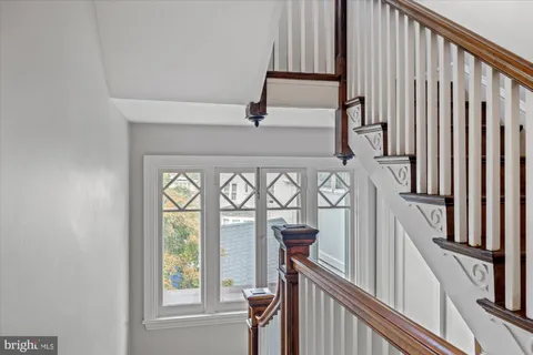 a bathroom with a sink a shower curtain and a shower