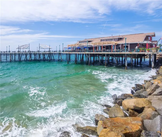 a view of a garden with lawn chairs