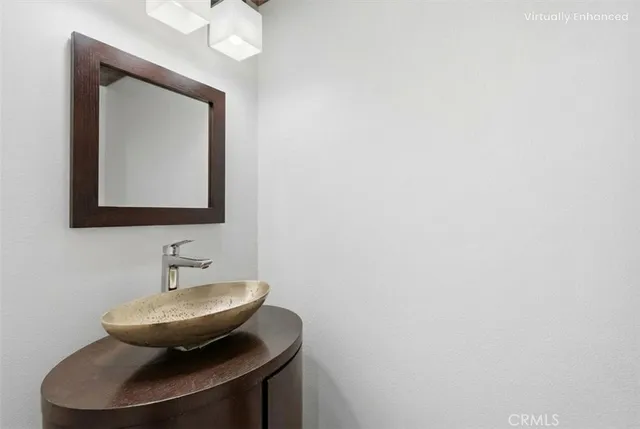 a bathroom with a toilet and a sink
