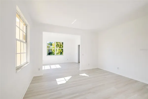 an empty room with windows