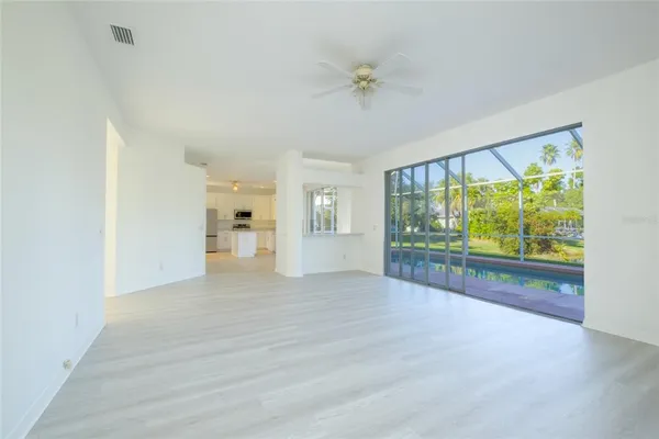 a view of an empty room with a window