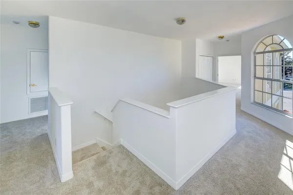 a view of livingroom with furniture and window