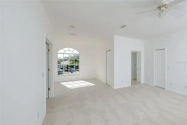 an empty room with windows