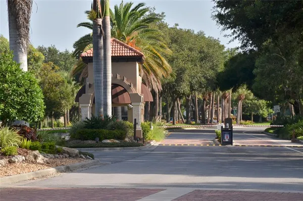 a view of a building with traffic signal lights